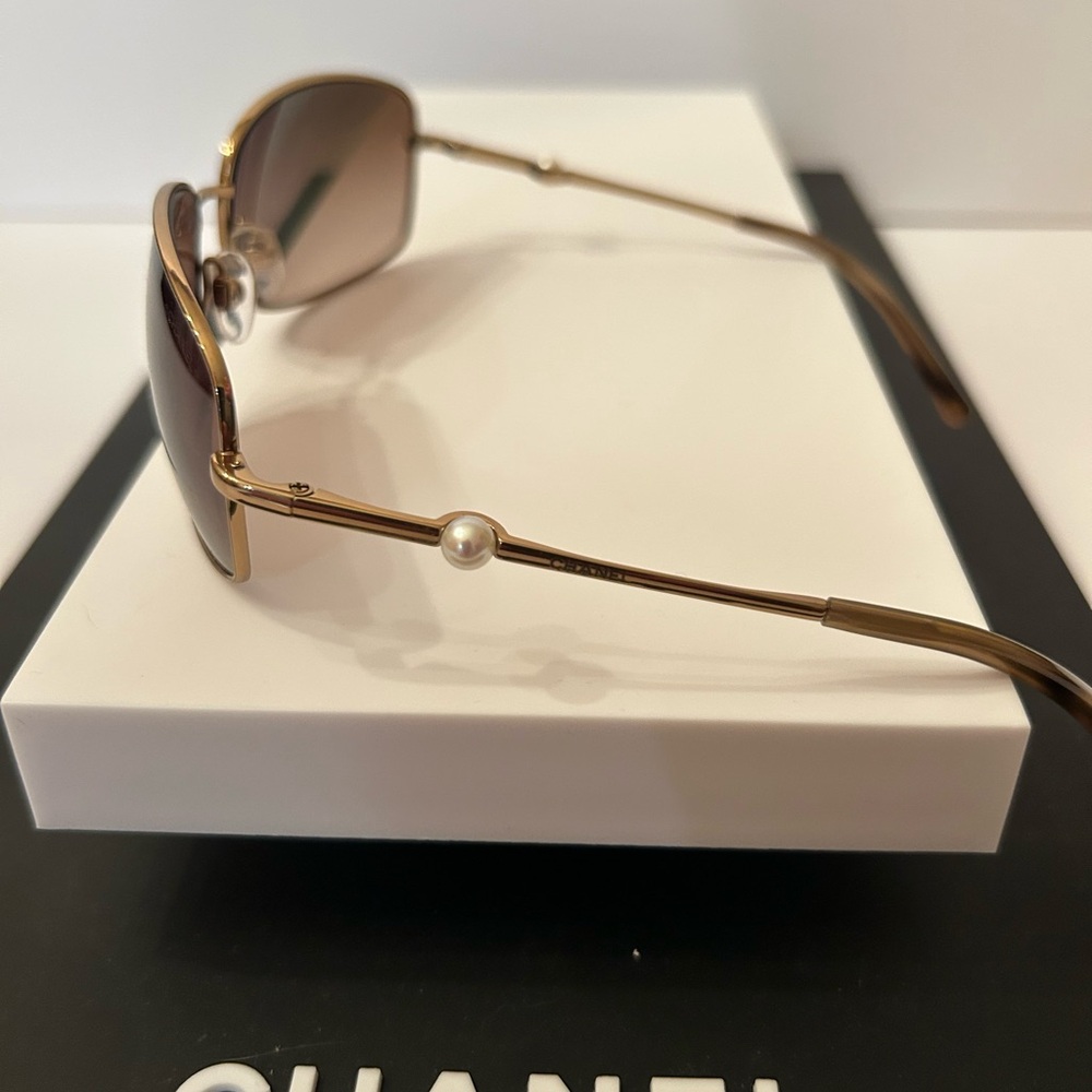 CHANEL Gold Sunglasses with Pearl Embellishment
